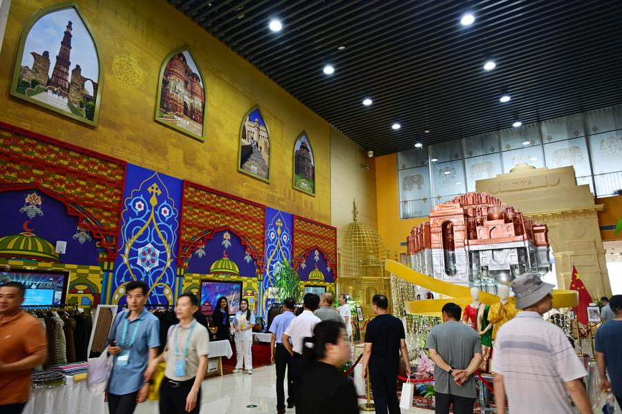 People visit the pavilion of India during the 2025 Shanghai Cooperation Organization (SCO) International Investment and Trade Expo in Qingdao, east China's Shandong Province, July 18, 2025. (Xinhua/Li Ziheng)